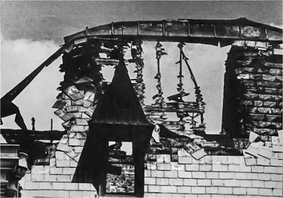 Section of Burnt Roof With Decorative Window