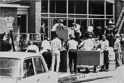 Staff Removing Files From Administration Wing During The Fire